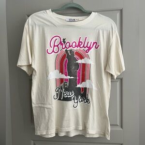 Anthropologie Cream Graphic Tee with Pink and Black Accents